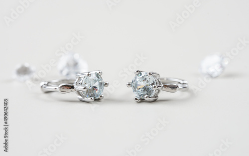 beautiful diamond earrings. Close-up of white diamond earrings. 