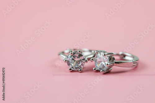 beautiful diamond earrings. Close-up of white diamond earrings. 