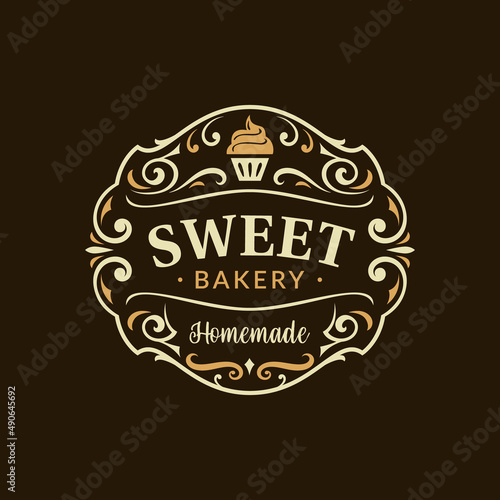 Vintage bakery shop logo design vector. Label for bakery shop with cupcake symbol.
