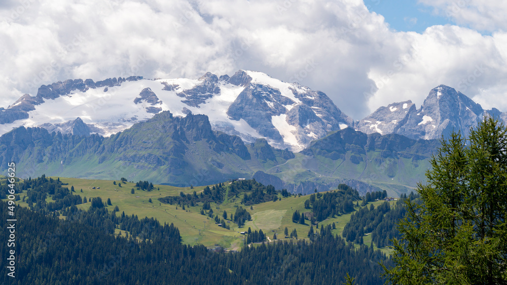 Amazing landscape to the Marmolada and its glaciers during summer time. It is the highest mountain of the Dolomites. Italian alps Amazing landscape to the Marmolada and its glaciers during summer time. It is the highest mountain of the Dolomites. Italian alps