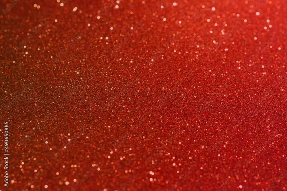 Red glitter bokeh abstract background.