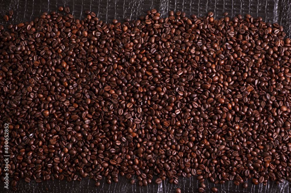 Naklejka premium coffee beans background