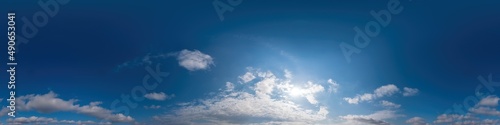 Blue sky panorama with Cirrus clouds in Seamless spherical equirectangular format. Full zenith for use in 3D graphics, game and editing aerial drone 360 degree panoramas for sky replacement.