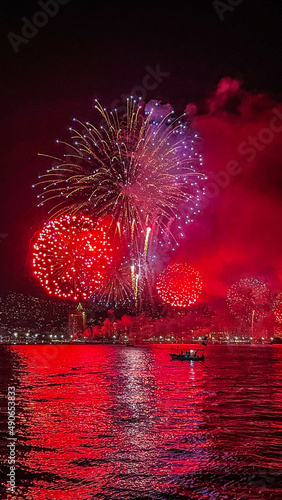 Canvas Print fireworks over water