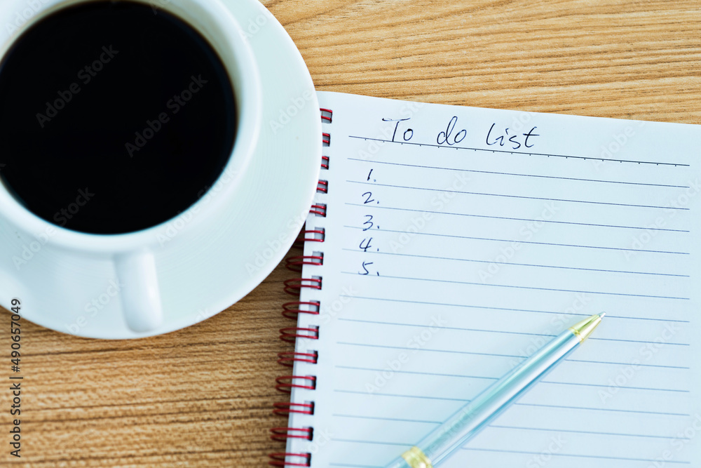 To do list with pen and coffee To do list with pen and coffee