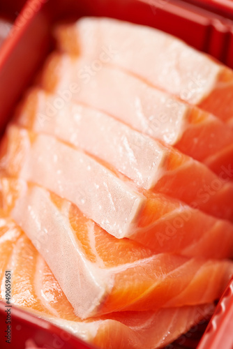Raw salmon sashimi in packaging 