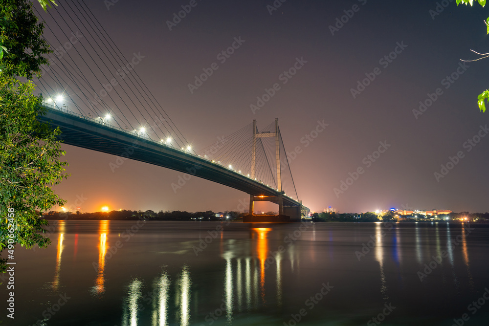 Naklejka premium Vidyasagar Setu is the longest cable-stayed bridge and the second on Hooghly River at the dusk time in Kolkata, West Bengal, India.
