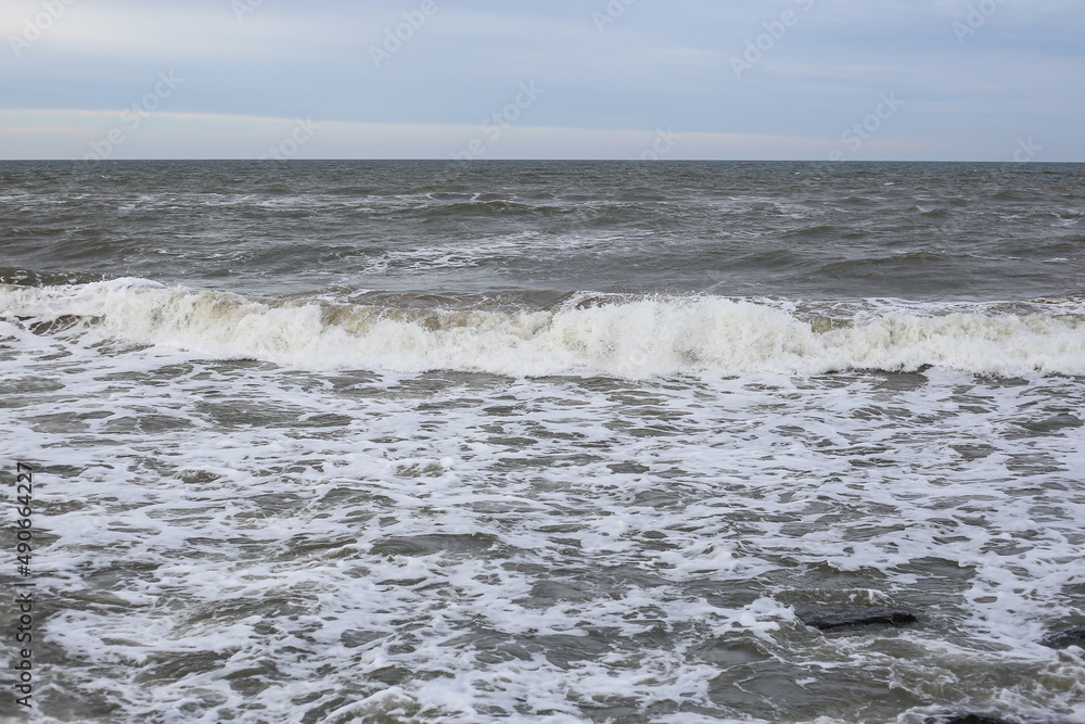 Fototapeta premium Baltic sea seascape view of shoreline and small waves.