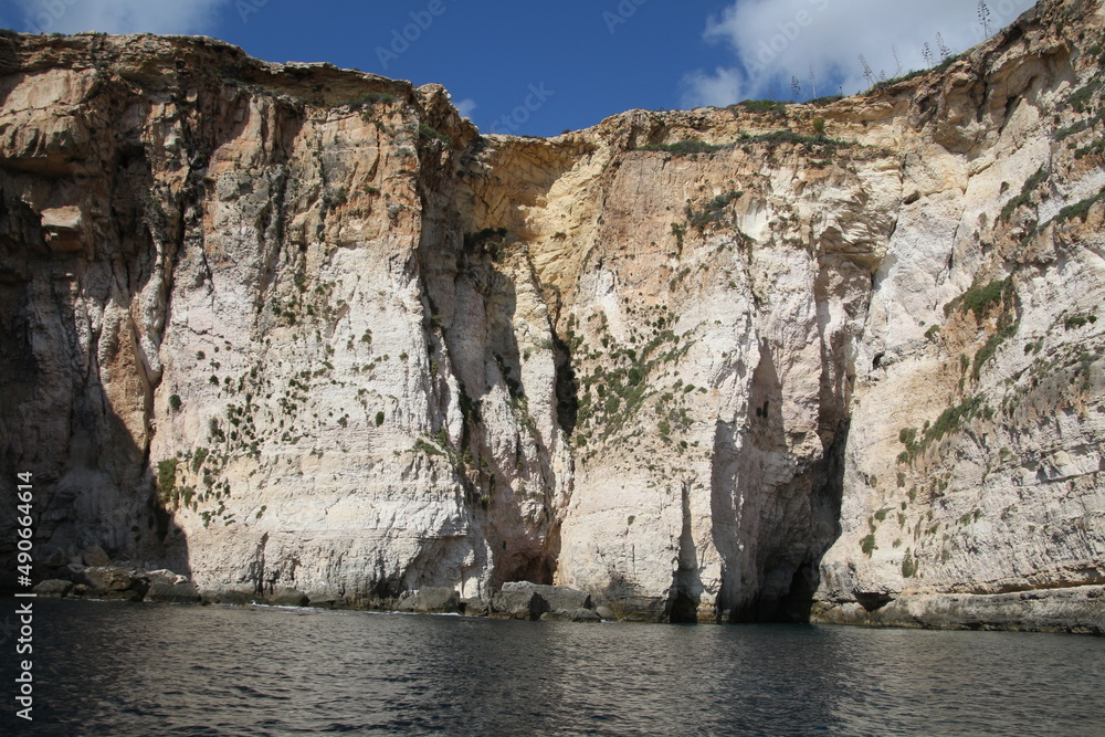 Steep cliffs at the Blue Grotto on the island of Malta