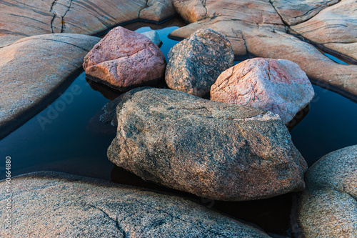 Stones lying in water, Sweden