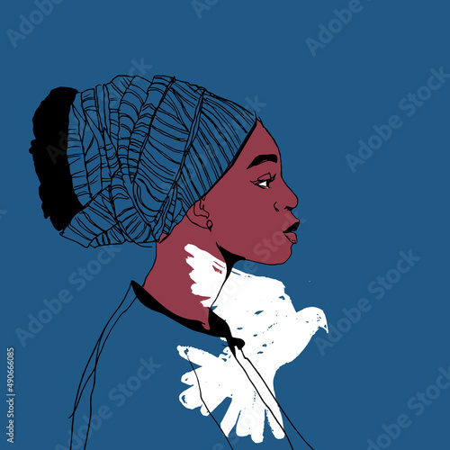 Face profile of a sad Afro girl with a silhouette of a white dove, the concept of peace