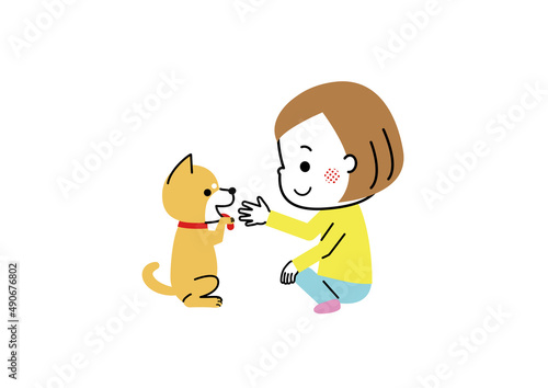 女の子と柴犬　ちんちんしている柴犬