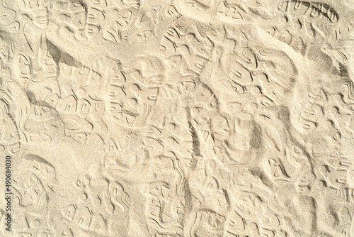 Fototapeta Naklejka Na Ścianę i Meble -  Texture of sea sand background closeup with ornament