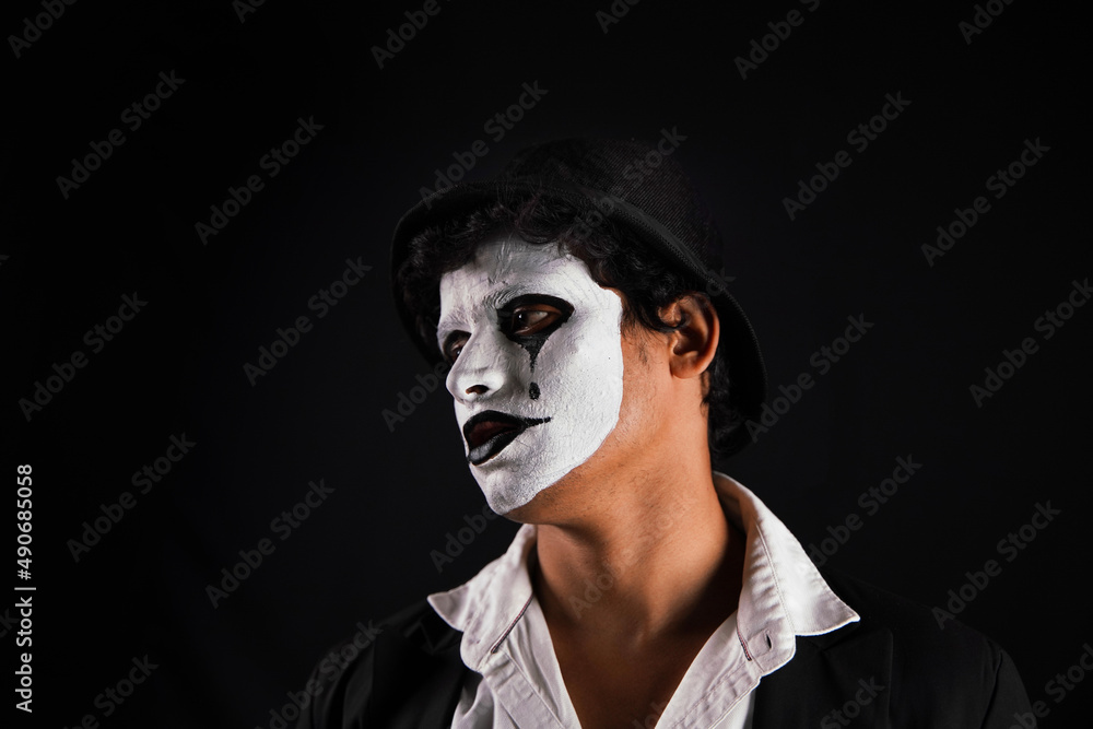 Mime artist isolated on black background