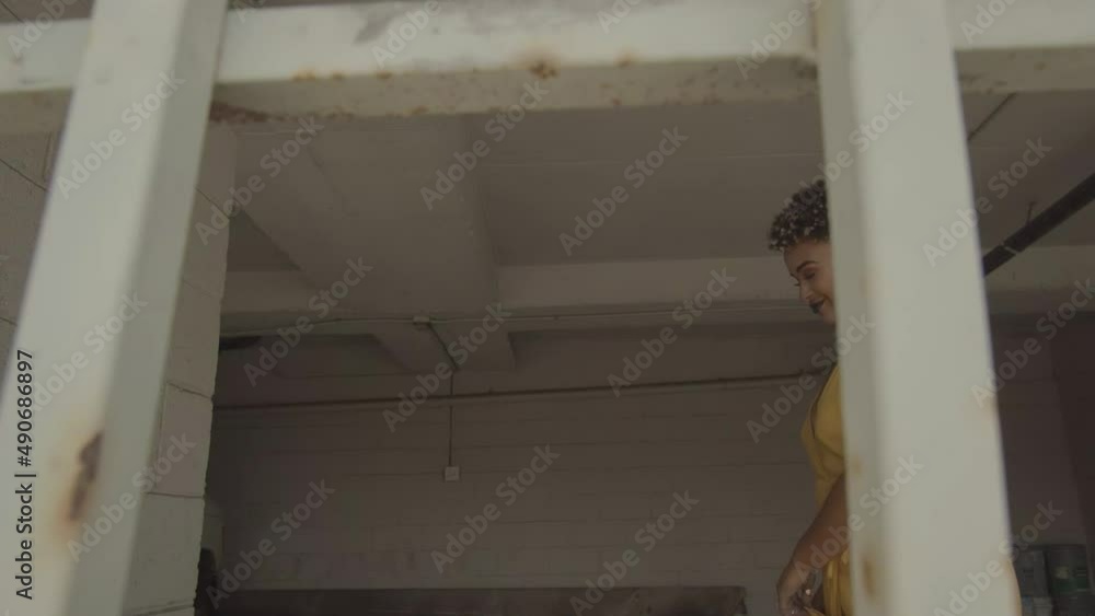 Motion video sequence of a beautiful woman in yellow dress. Artsy conceptual footage. Motion video sequence of a beautiful woman in yellow dress. Artsy conceptual footage.