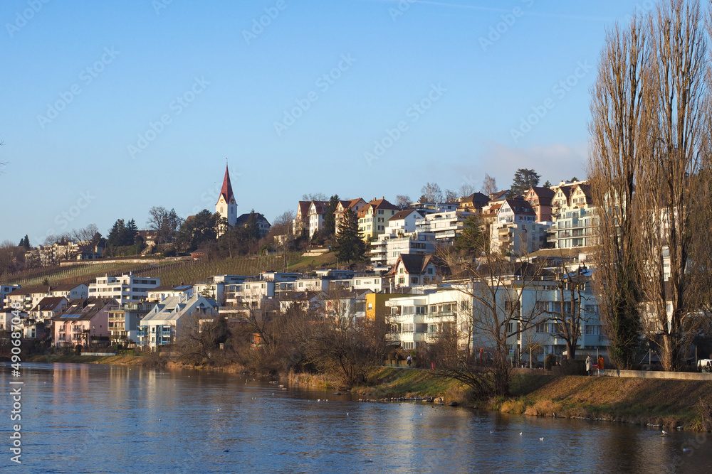 Zurich, Switzerland - December 18th 2021: Suburban neighbourhood of Hoengg, situated directly at the Limmat river.
