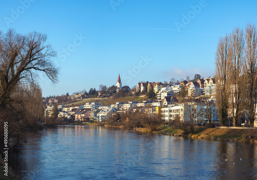 Zurich, Switzerland - December 18th 2021: Suburban neighbourhood of Hoengg, situated directly at the Limmat river. photo