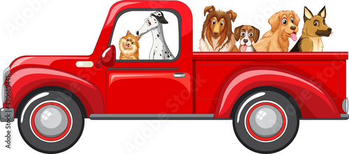 Many dogs riding on red truck