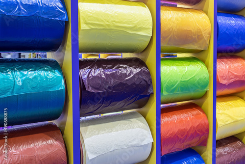 Billede på lærred rolls with cellophane film of different colors for packaging