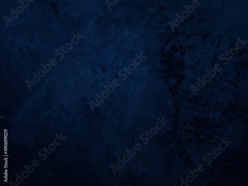 Dark rough cement wall background for graphic design or wallpaper.