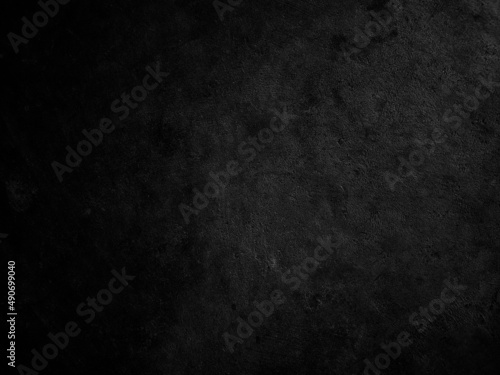 Dark cement wall background in vintage style for graphic design or wallpaper