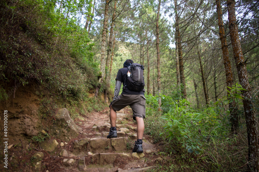 One backpacker man travel alone, with backpack in the mountains
One backpacker man travel alone, with backpack in the mountains