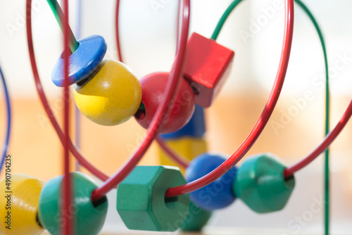 educational wooden toy - what to play with children at home, selective focus