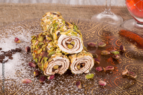 Mixed Turkish delight, rakhat, lokum, Turkish sweets, pistachio, chocolate, cream on white background photo