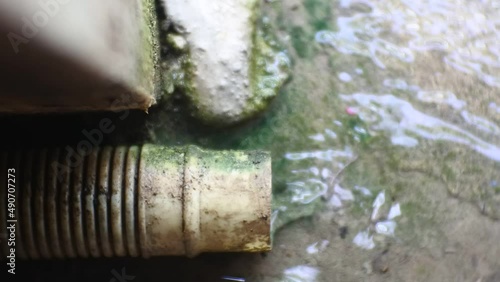 water coming out of washing machine drain pipe photo