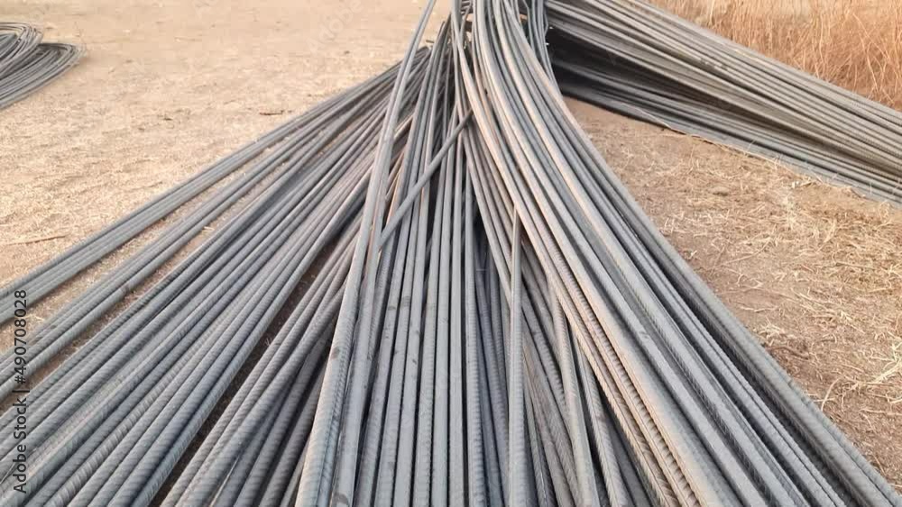 Construction rebar steelwork reinforcement in the concrete structure of the building. Close up