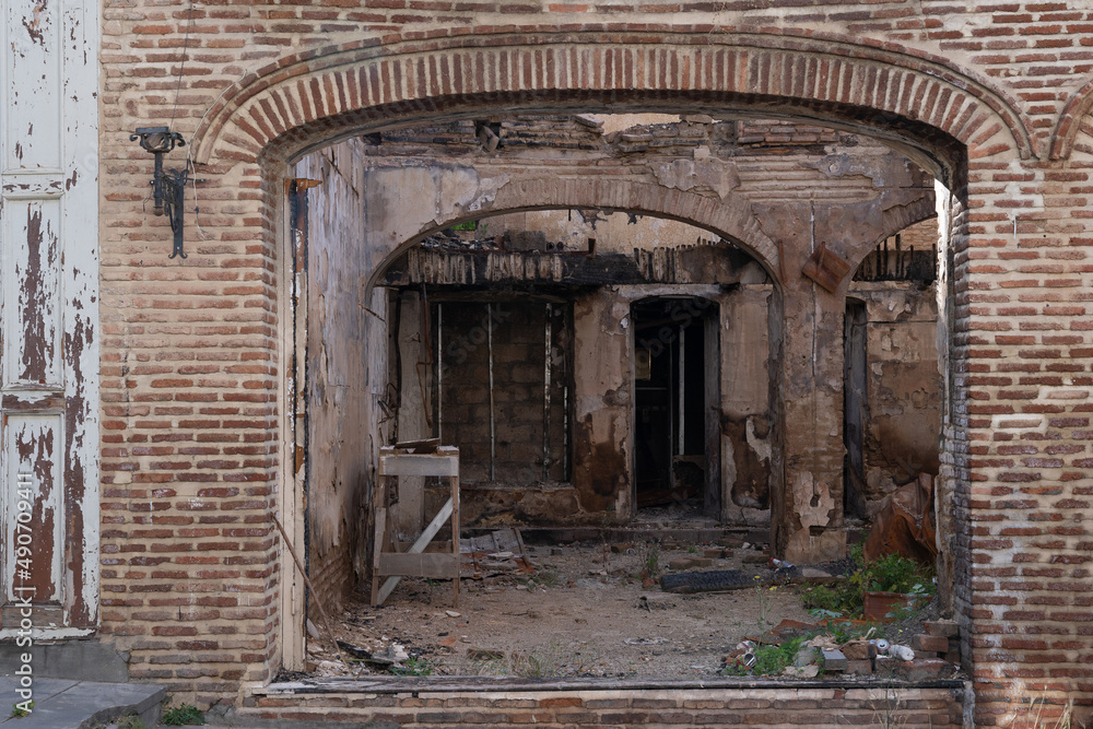 Fototapeta premium old abandoned buildings that have suffered a fire and are left burnt bricks.