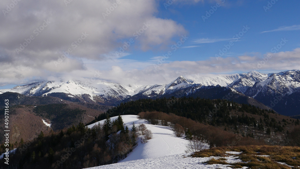 Fototapeta premium France, Ariege, Mountains Pyrenees, winter sports scene, skiers on the slopes, High quality 4k footage