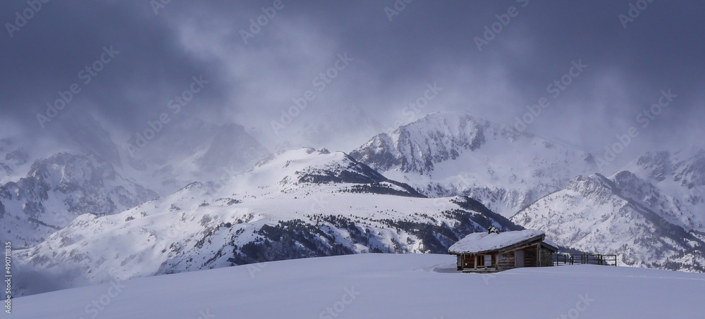Winter panorama, and isolated chalet in the snow,Mountains Pyrenees, winter scene, France, Ariege. High quality photo