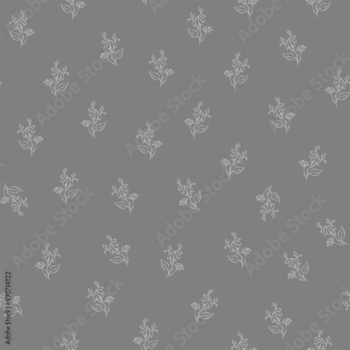 Vector gray and white illustration. Floral seamless pattern. Bouquet of wild flowers. Hand drawn flower field. Simple flowers. Flowering heads of field chamomile. Outline drawing.