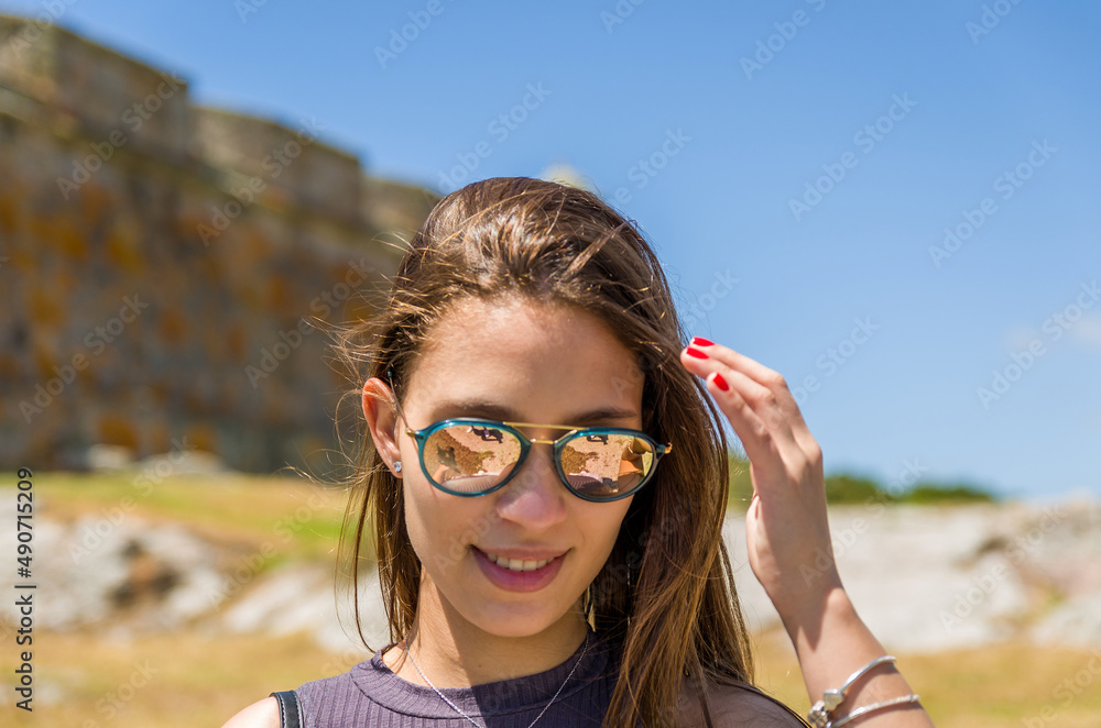Female tourist visiting Forte de Santa Tereza Female tourist visiting Forte de Santa Tereza