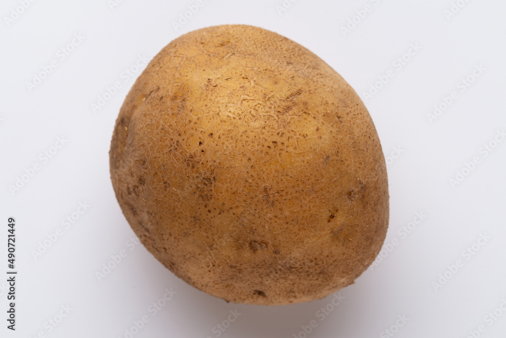 Fototapeta premium Potatoes isolated on white background. Flat lay. Top view.