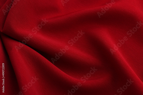 Smooth elegant red satin silk background. Copy space for text anniversary christmas background