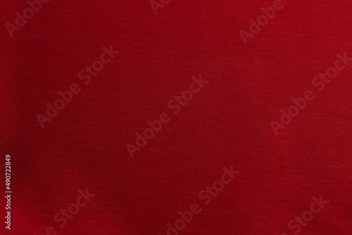 Smooth elegant red satin silk background. Copy space for text anniversary christmas background