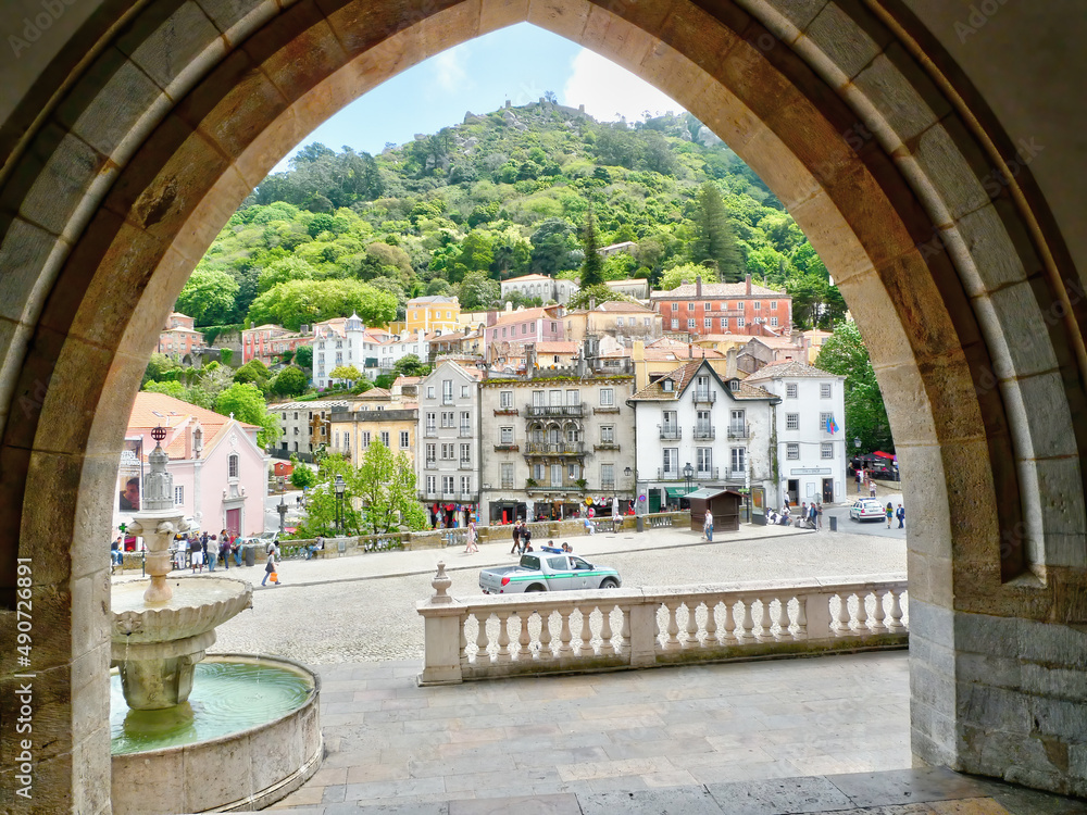 View of The Town of Sintra from an archway of Sintra National Palace. - obrazy, fototapety, plakaty 