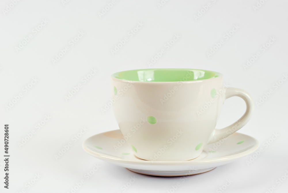 Ceramic coffee mug close up. Coffee isolated on a white background. Copy space and free space for text near the drink. Ceramic coffee mug close up. Coffee isolated on a white background. Copy space and free space for text near the drink.