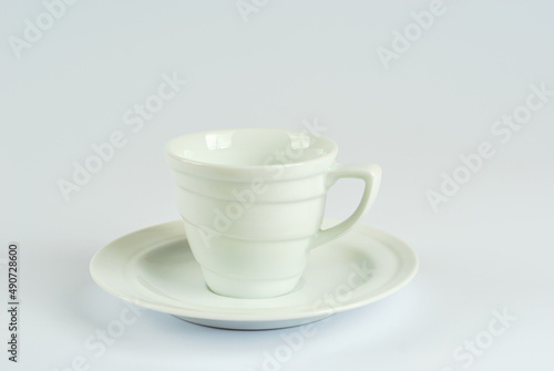 Ceramic coffee mug close up. Coffee isolated on a white background. Copy space and free space for text near the drink.