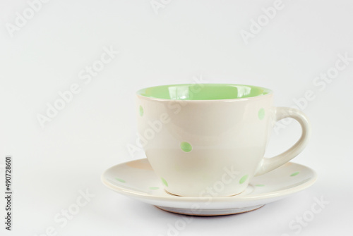 Ceramic coffee mug close up. Coffee isolated on a white background. Copy space and free space for text near the drink.
