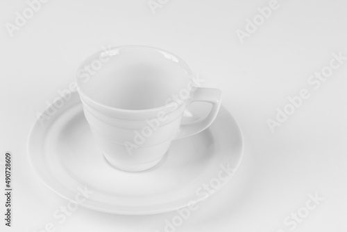 Ceramic coffee mug close up. Coffee isolated on a white background. Copy space and free space for text near the drink.