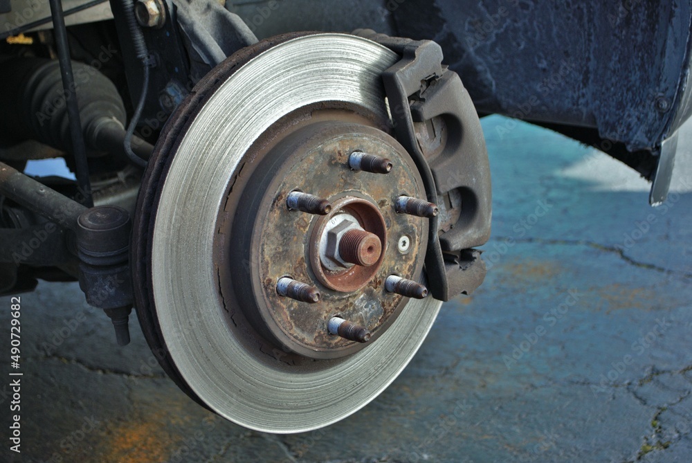 ruined disc brake rotor seen on a vehicle ruined disc brake rotor seen on a vehicle