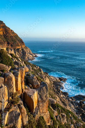 Chapman's peak pass - between Hout Bay and Noordhoek.  This scenic drive passes along sheer cliff faces and rugged coastline with dramatic sunsets.  