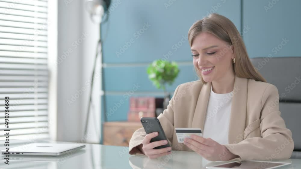 Businesswoman Shopping Online on Smartphone at Work Businesswoman Shopping Online on Smartphone at Work