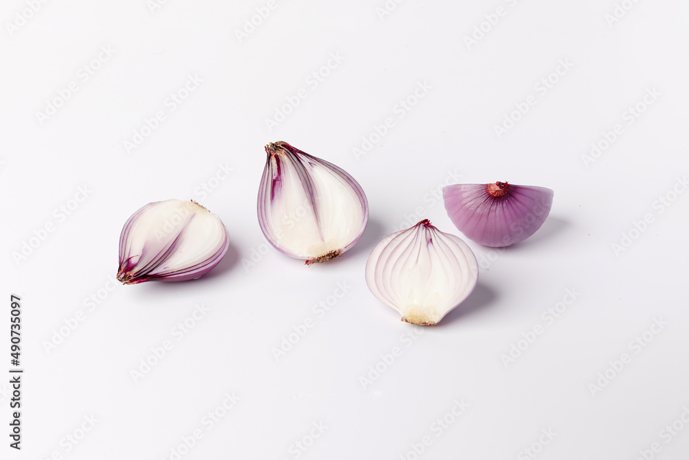 Peeled cutting shallot close up on white background Peeled cutting shallot close up on white background