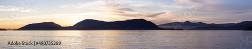 Panoramic View of Canadian Nature Mountain Landscape on the Pacific Ocean West Coast. Colorful Winter Sunset. Taken in Howe Sound near Horseshoe Bay  West Vancouver  British Columbia  Canada.