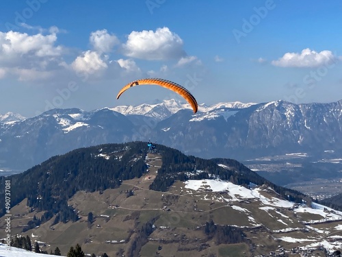 Paraglider in the Air above the mountains1