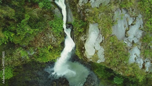 Beautiful waterfall spiral overhead shot